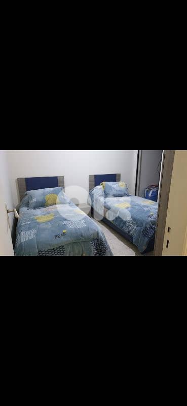 kids crib and 2 single beds 1