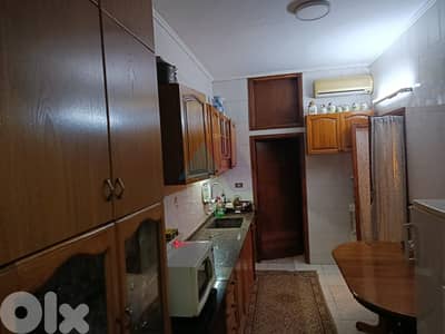 Furnished 2 bedroom apartment 4sale in Ain el remaneh-عين الرمانة