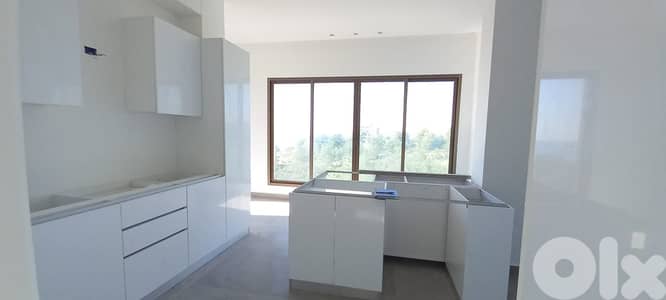 L08699 - A Deluxe Apartment for Rent in Adma with Garden and Sea View
