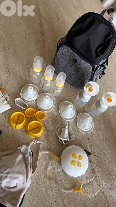 Medela double   - optimal wearable breast pump-  tommee tippee manual 0