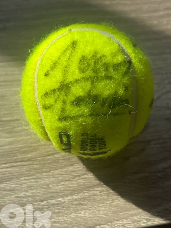 signed padel ball 1