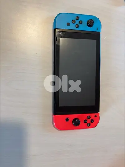 Nintendo Switch + 6 games + Case + accessories