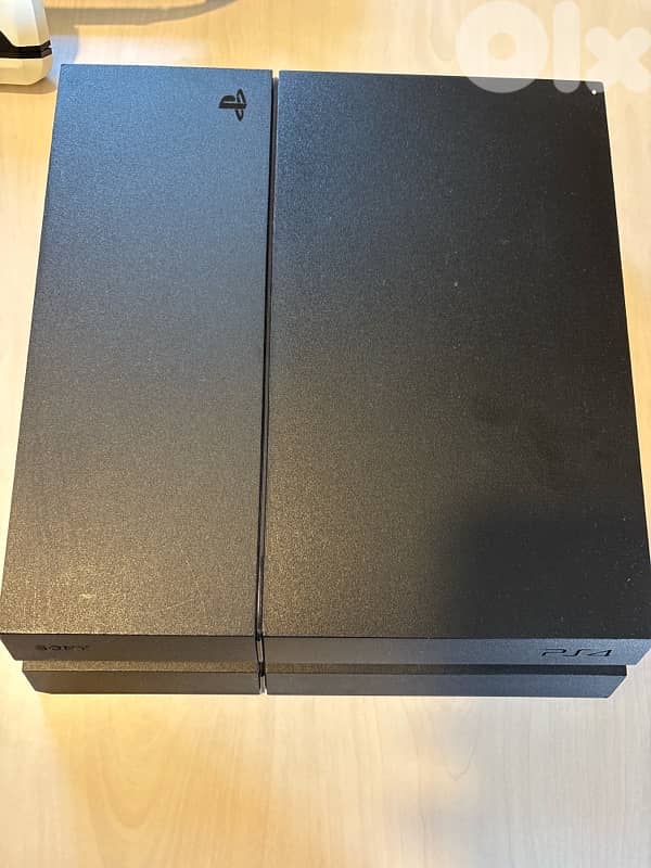 PS4 + 3 controller + 6 working games 1