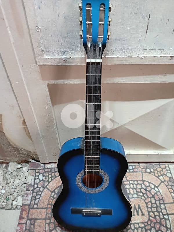Beautiful blue guitar is for starters. 0