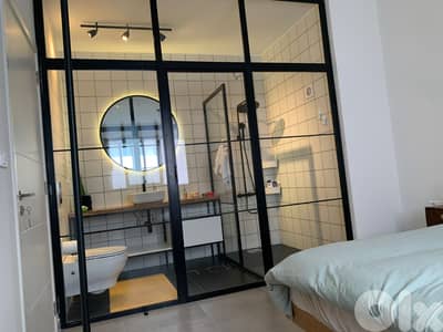 Modern Furnished 1BR + Private Rooftop & Panoramic Views
