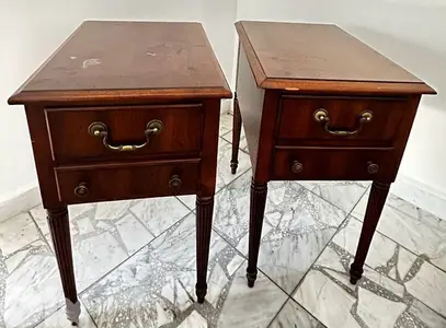 2 wooden coffee tables with drawers.