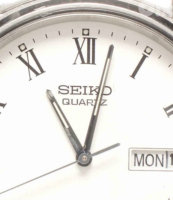 Vintage Seiko SQ Quartz white Roman Dial Day-Date Watch 1