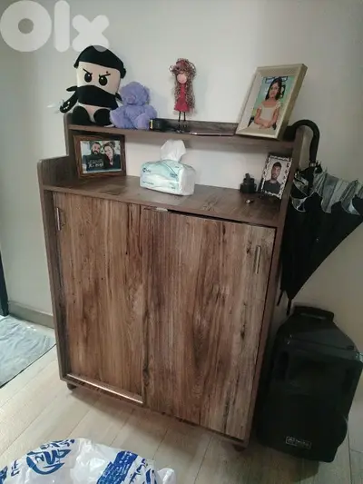big shoe closet with shelf