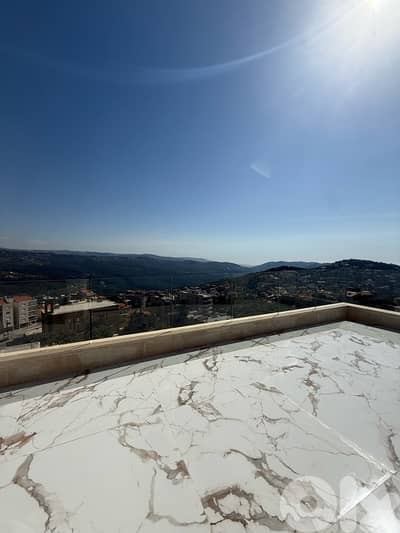 High end rooftop apartment for sale in Baabdat W/ open mountain views