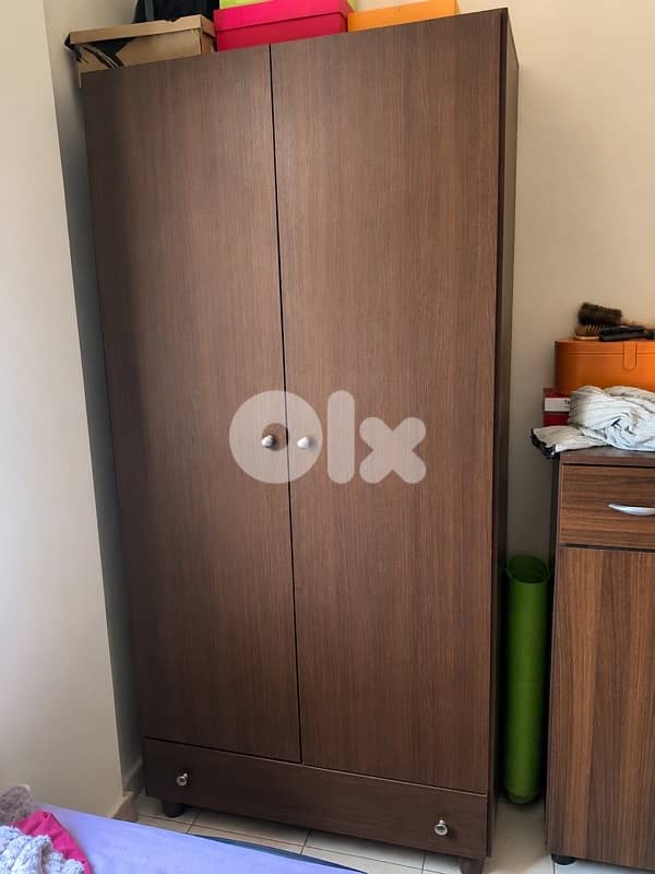 Brown wood closet 0