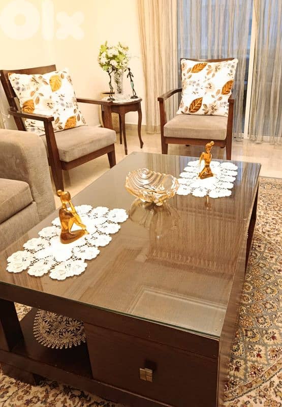 Living room sofas, tables, carpet and chadelier 2