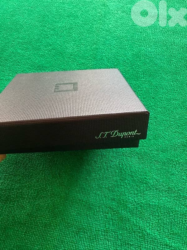Original S. T. Dupont genuine leather keychain. 4