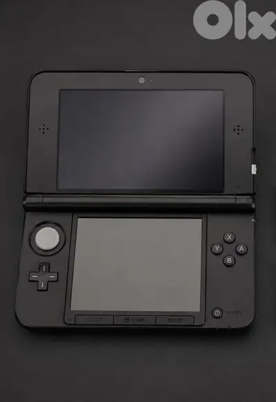 nintendo 3ds xl with games and sd cards