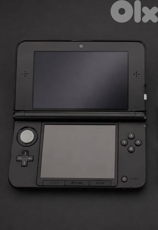 nintendo 3ds xl with games and sd cards 0