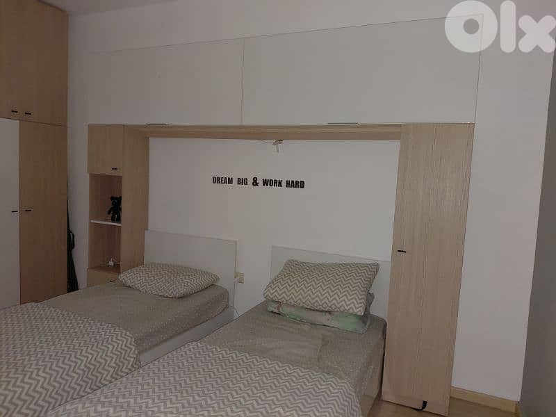 2 single bed with bridge wardrobe with desk 1