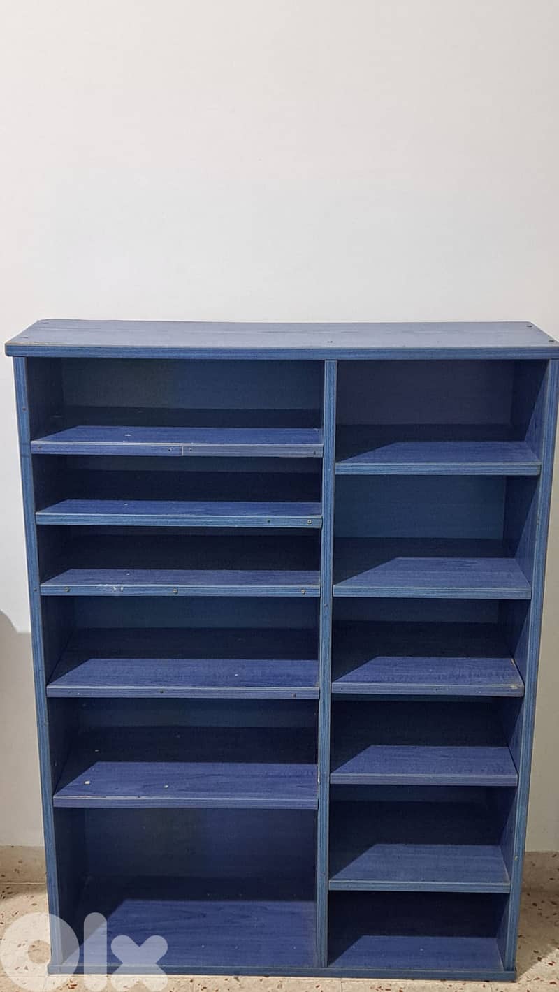 Blue wooden shelving unit 0