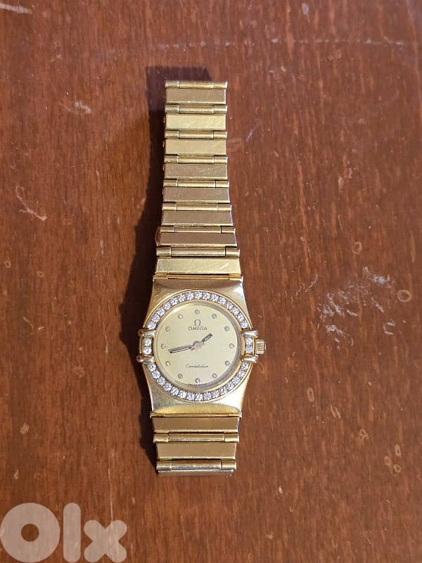 omega full gold 18k 0
