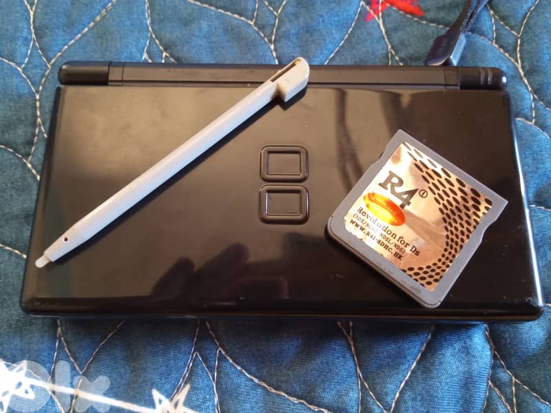 Used black ds lite(but in good condition) either 4 card if u whant 0