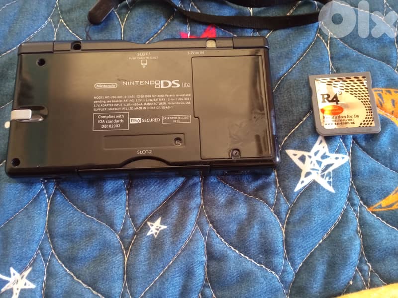 Used black ds lite(but in good condition) either 4 card if u whant 2