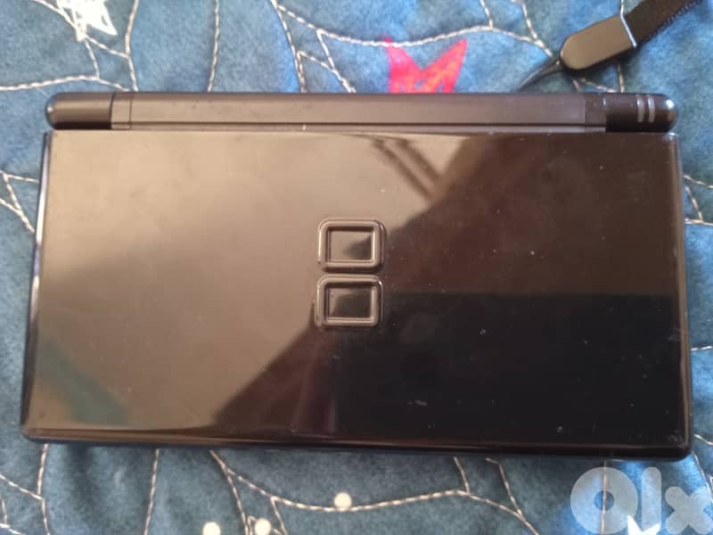 Used black ds lite(but in good condition) either 4 card if u whant 4