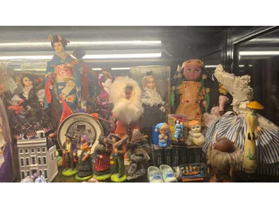 Doll collection handmade with the glass  cabinet