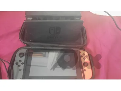 used nintendo switch with 3 games and accessories