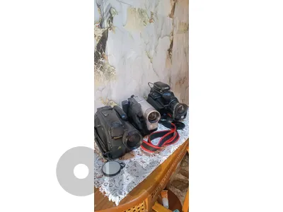 3 vintage film cameras,