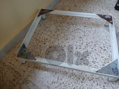 قاعدة حديد للغسالة