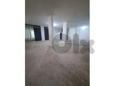 SPACIOUS WAREHOUSE FOR RENT IN MANSOURIEH PRIME ,(MANR-317)
