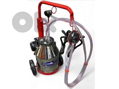 Milking machine آلة حلب الحليب