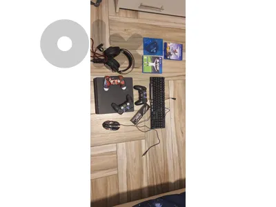 ps4 + controllers + games ... all in the picture