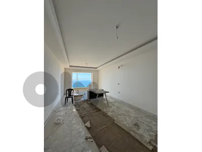 Apartment with garden and sea view in Dohet el Hoss • شقة مع حديقة واطلالة بحرية في دوحة الحص للبيع