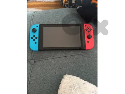 Nintendo Switch "V2" (Model 2019). with controller+bag