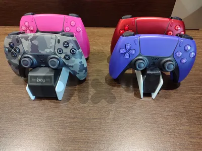 4 Ps5 controllers with charging dock