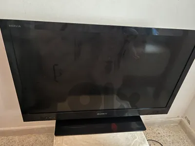 two tv with table