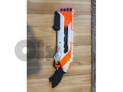 Orange Nerf Gun (8 slots for bullets) (comes with bullets]