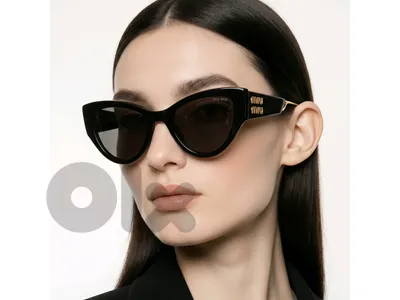 MIU MIU Black frame sunglasses
