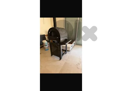 balck metal pizza oven