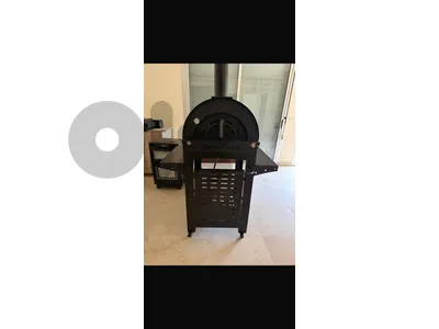 balck metal pizza oven