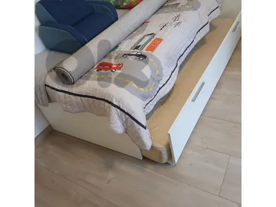 bed with 2 mattress and closet