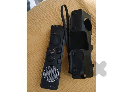 Vintage mini radio with leather box from Aiwa
راديو قديم مع بيت جلد