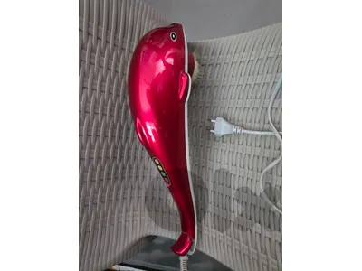 Dlophin shaped massager