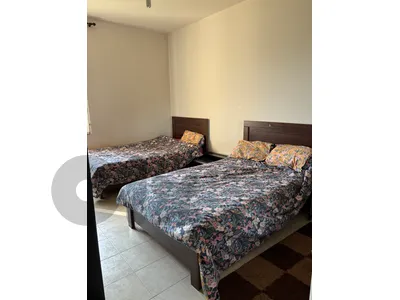 2 beds with their mattresses
