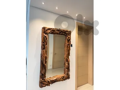 unique piece imported handcrafted rectangular mirror with a rustic frame assembled entirely from natural wood roots and branches