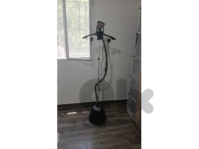 مكواية ستاند