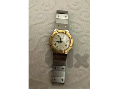 Vintage LADIES' RAYMOND WEIL STAINLESS STEEL & GOLD WRISTWATCH #9904(100% original)