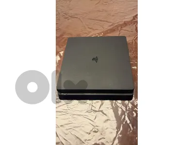 ps4 slim for sale with 2 original controllers and 2 cds