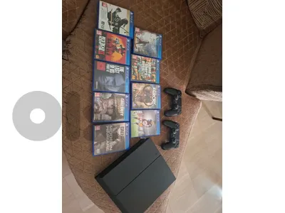 PS4 fat + 2 controllers + 9 games