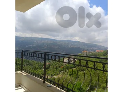 Spacious apartment for sale in Ajaltoun with open greenery views.
