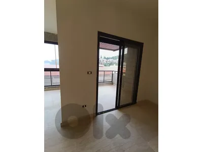 Apartment for sale in Tilal Ain Saade 250,000$ شقة مع تراس في تلال عين سعادة